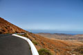 Mountains and ocean - mountains near Betancuria and in the background the atlantic ocean